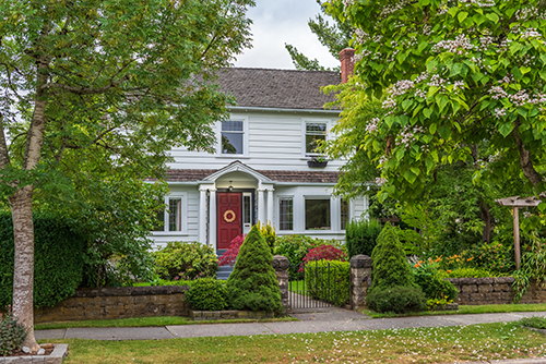 Colonial home with mature landscape cared for by tree companies Ocean County